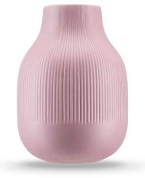 Die Vase Botan 22 cm altrosa ist eine hellrosa Keramikvase mit rundem Boden, schmalem Hals und vertikaler Rippenstruktur auf der oberen Hälfte. Durch die matte, glatte Oberfläche eignet es sich ideal für moderne Einrichtungen.