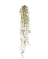 Eine künstliche Hängepflanze Grass 91 cm mit langen, nachhängenden hellgrünen Blättern hängt an einer schwarzen Kordel vor einem schlichten weißen Hintergrund.