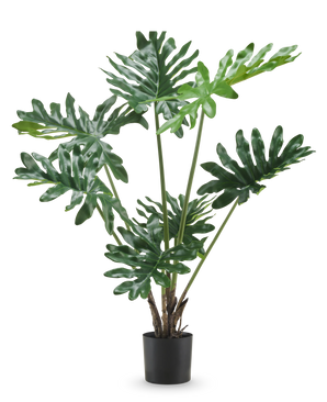 Die Kunstpflanze Philodendron 90 cm hat große, glänzend dunkelgrüne, gespaltene Blätter und mehrere aufrechte Stängel in einem hohen Topf vor einem schlichten weißen Hintergrund.
