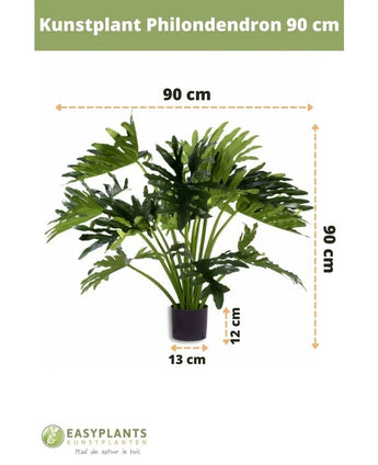 Kunstpflanze Philodendron UV 90 cm im schwarzen Topf, mit 90 cm breiten Blättern. Perfekt für jeden Raum. Topfgröße: 12 cm hoch, 13 cm breit. Easyplants-Logo unten.