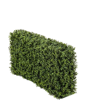 De Kunst Buxushaag UV 100x20x50 cm heeft een dichte, groene rechthoekige haag tegen een effen witte achtergrond.