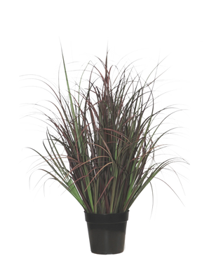 Die Kunstrasenpflanze Wild Lawn 70 cm, feuerhemmend, hat dunkelgrüne und rot-lila schmale Blätter in einem schwarzen Topf – perfekt als wartungsfreie Pflanze für jeden Innenraum.