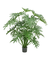 Een Kunstplant Philodendron 125 cm met grote, groene, diep gespleten bladeren tegen een witte achtergrond.